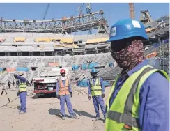  ?? FOTO: HASSAN AMMAR/AP/DPA ?? Katar soll die Menschenre­chte der Arbeitsmig­ranten auf den Baustellen der WM-Stadien missachtet haben.