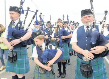  ??  ?? The show will go on Strathaven residents have previously enjoyed the sound of the pipers