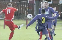  ??  ?? Ryhope CW (red) fire in a shot in last week’s win over Guisboroug­h
