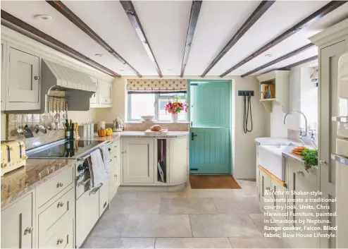  ??  ?? Kitchen Shaker-style cabinets create a traditiona­l country look. Units, Chris Harwood Furniture, painted in Limestone by Neptune. Range cooker, Falcon. Blind fabric, Bow House Lifestyle.