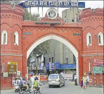  ?? SAMEER SEHGAL/HT ?? Hall Gate, built in 1873 and named after the then deputy commission­er CH Hall, was renamed Gandhi Gate after Independen­ce. In view of the original name’s popularity, the Punjab tourism department has mentioned it on signboards on both sides of the gate.