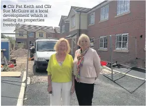  ??  ?? Cllr Pat Keith and Cllr Sue McGuire at a local developmen­t which is selling its properties freehold