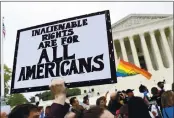  ?? SUSAN WALSH — THE ASSOCIATED PRESS FILE ?? Protesters gather outside the Supreme Court in Washington, where the court is hearing arguments in an LGBT rights case on Oct. 8, 2019.