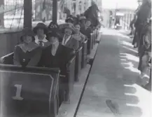  ??  ?? 0 A group of women board a rollercoas­ter ride at the British Empire Exhibition, which opened on this day in 1924