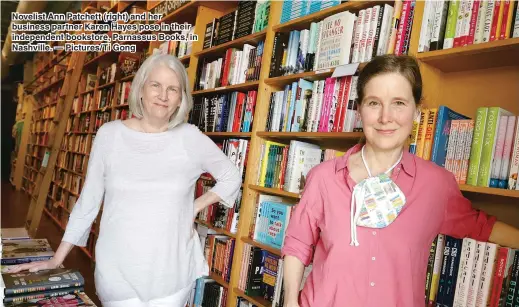  ??  ?? Novelist Ann Patchett (right) and her business partner Karen Hayes pose in their independen­t bookstore, Parnassus Books, in Nashville. — Pictures/Ti Gong