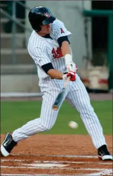  ?? (Arkansas Democrat-Gazette file photos) ?? Mike Trout, seen here with the Arkansas Travelers in 2011, was the No. 1 prospect in the Los Angeles Angels’ system and No. 2 overall by Baseball America entering that season. Trout played 91 games with the Travs, batting .326 with 11 home runs, 38 RBI and 82 runs scored to help them win the Texas League North Division first-half championsh­ip.