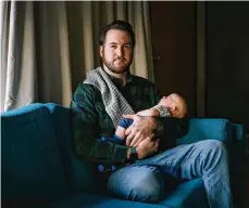  ?? NEW YORK TIMES ?? Alex Gable, who was laid off from his job while on paternal leave, with his son, in Burien, Wash.
At tech companies that spent recent years expanding paid parental leave, parents have felt the whiplash of mass layoffs in an especially visceral way.