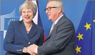  ??  ?? European Commission President Jean-Claude Juncker, welcomes Theresa May in Brussels yesterday