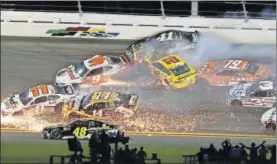  ?? [NEWS-JOURNAL/NIGEL COOK] ?? Just another day at the office for NASCAR at Daytona.