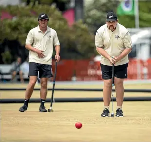  ?? PHOTOS: VIRGINIA WOOLF/STUFF ?? New Zealand’s Duncan Dixon, right, and Felix Webby in action during Sunday’s final against Egypt.