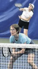  ?? RICHARD MACKENZIE ?? Truro tennis players Michele White-lowe (foreground) and Shelley Flemming competing at a recent tennis tournament at the Cougar Dome.