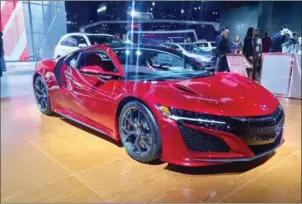 ?? PETER HOLLEY/THE WASHINGTON POST ?? The 2018 Acura NSX .