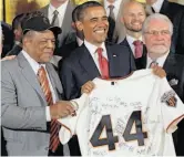  ?? Win Mcnamee / Getty Images 2011 ?? Giants legend Willie Mays and General Manager Brian Sabean with President Obama in July.