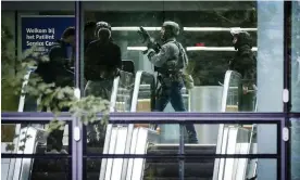  ?? AFP/Getty Images ?? Dutch police officers secure the Erasmus University medical centre. Photograph: ANP/