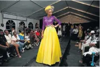  ??  ?? CATWALK: Xhosa dress in traditiona­l, top, and modern form, below