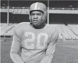  ?? MURRAY BECKER/ASSOCIATED PRESS ?? Running back George Taliaferro started his profession­al career with the New York Yanks in 1950. The team later moved to Dallas and then became the Baltimore Colts in 1953.