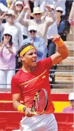  ??  ?? ALBERTO SAIZ/AP Spain's Rafael Nadal returns the ball to Germany's Alexander Zverev during a Davis Cup quarterfin­al match between in Valencia, Spain, on April 8, 2018.