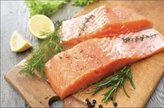  ?? GETTY IMAGES ?? Wild salmon and mackerel have upward of 1,500 mg of omega-3s per 3.5-ounce serving, which can help you meet your EPA and DHA needs.
