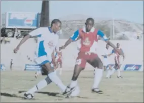  ??  ?? Bird of passage... Much travelled attacking midfielder-cum-forward “Codesa” (left) seen here in action battling for ball possession with Civics’ midfield general Congo Hindjou.