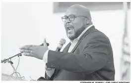  ?? STEPHEN M. DOWELL/ORLANDO SENTINEL ?? Bishop Kelvin L. Cobaris speaks at the “Enough is Enough Community Meeting” at the New Life Church of God in Christ in Orlando on Thursday.