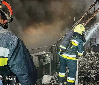  ?? Photograph: Ukrainian Emergency Service ?? Firefighte­rs at work at the Trypilska plant, which supplied three million customers in the Kyiv, Cherkasy and Zhytomyr regions