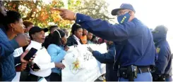  ?? AYANDA NDAMANE African News Agency (ANA) ?? MBEKWENI residents outside the Paarl Magistrate’s Court protesting about the murder of Siphokazi Booi. |