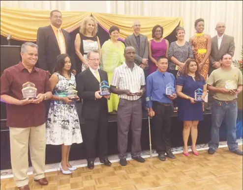  ??  ?? Front row from left: Captain Gerald Gouveia of Roraima Group of Companies, Rehana Rahim of Palm Springs Hotel, Shawn McGrath of Cara Lodge, Gary Jordon of Obama Boat Service, Dicky Alvin of Rewa Eco Lodge, Iwokrama representa­tive Shera Seelall and...