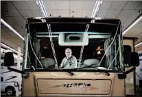  ?? STACEY WESCOTT/CHICAGO TRIBUNE ?? Tony Mucerino sits in a 2016 Allegro Open Road 34-foot motor home, one of the many models he sells at Hometown RV in Carol Stream.