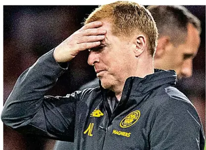  ??  ?? Headache: Lennon suffers as Celtic collapse against Cluj