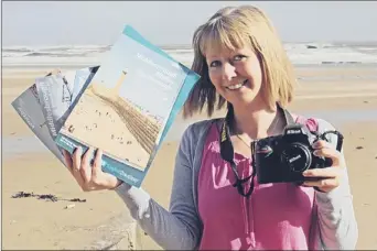  ??  ?? CITY SNAPPER: Marie Gardiner with some of the North East tourism brochures which feature her photograph­s.