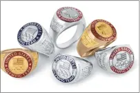  ?? Washington Post photo ?? U.S. athletes receive rings for participat­ing in events at the 2018 Olympics in South Korea.