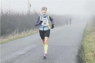  ??  ?? RECORD BREAKER: Susan Hall broke the Halifax Harriers’ F70 club record at the Inskip Half Marathon.