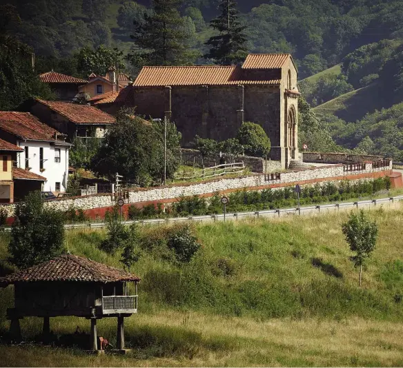  ??  ?? Above: Terracotta rooftops and empty A-roads are the order of the day in Asturias, as Cyclist approaches the final climb