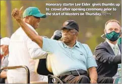  ?? GETTY ?? Honorary starter Lee Elder gives thumbs up to crowd after opening ceremony prior to the start of Masters on Thursday.