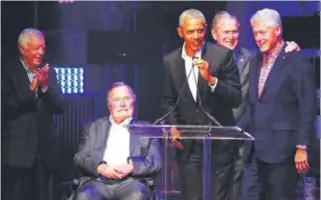  ?? REUTERSPIX ?? ... Five former US presidents (from left) Jimmy Carter, George H. W. Bush, Barack Obama, George W. Bush and Bill Clinton, speak during a concert at Texas A&M University benefiting hurricane relief efforts in College Station, Texas on Saturday. The...