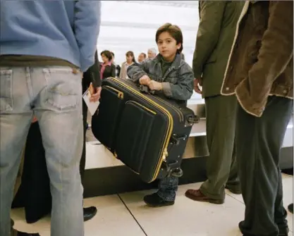  ?? MIKE POWELL, GETTY IMAGES ?? “Don’t let children wheel their own suitcases through the airport,” says Evie Granville, a political campaign manager who hosts a lifestyle podcast that often deals with etiquette issues. “Instead, pack a backpack for them to carry.”