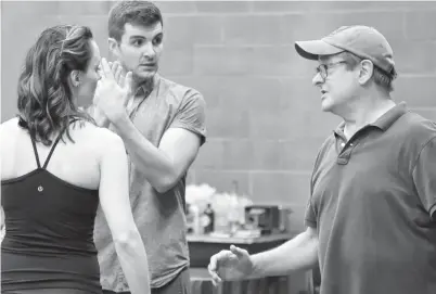  ?? [SUBMITTED] ?? Thoroughly Modern Millie, which opens next week in St. Jacobs, is being directed and choreograp­hed by Michael Lichtefeld. At right, he rehearsed with cast members Jayme Armstrong and Zach Trimmer.