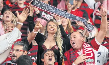  ?? AFP ?? Flamengo fans cheer their team during the Club World Cup final against Liverpool.