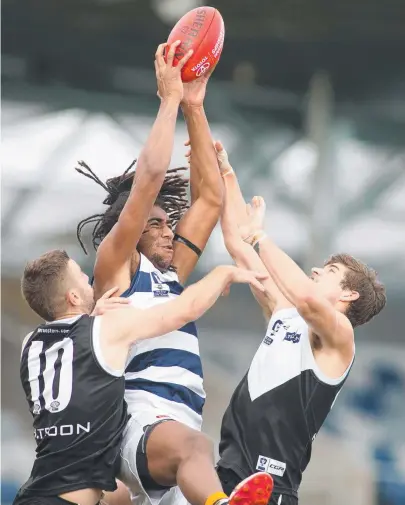  ?? Picture: ARJ GIESE ?? STRONG HANDS: Geelong's Esava Ratugolea in action against North Ballarat in the VFL yesterday.