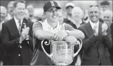  ?? AP ?? Brooks Koepka poses with the Wanamaker Trophy after winning the PGA Championsh­ip on Sunday.