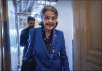  ?? J. SCOTT APPLEWHITE — THE ASSOCIATED PRESS ?? Sen. Dianne Feinstein, D-calif., who ha announced her retirement, walks through a Senate corridor at the Capitol in Washington on Tuesday.