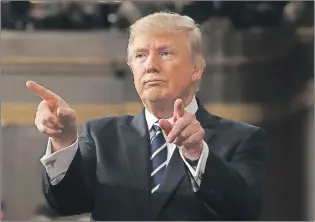  ?? AP PHOTO ?? U.S. President Donald Trump reacts after addressing a joint session of Congress on Capitol Hill in Washington, on Tuesday.