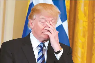  ?? AFP-Yonhap ?? U.S. President Donald Trump listens to a speaker during a Greek Independen­ce Day celebratio­n in the East Room of the White House in Washington, D.C., Friday.