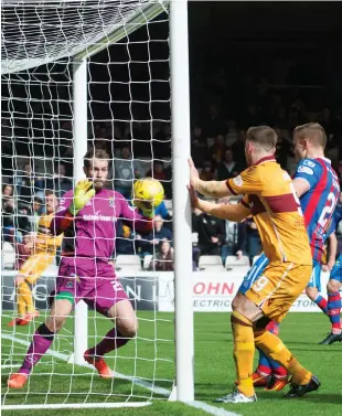  ??  ?? The Scott McDonald header that was controvers­ially judged to have crossed the line before being clawed away