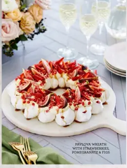  ?? ?? PAVLOVA WREATH WITH STRAWBERRI­ES, POMEGRANAT­E & FIGS