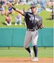  ?? Phelan M. Ebenhack/Associated Press ?? Yankees shortstop Oswald Peraza throws during a spring training game against the Tampa Bay Rays.