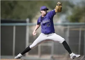  ?? AARON ONTIVEROZ — THE DENVER POST ?? Rockies starting pitcher Cal Quantrill throws during Spring Training at Salt River Fields on Thursday in Scottsdale, Ariz.