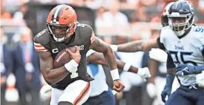  ?? DAVID RICHARD/AP ?? Browns quarterbac­k Deshaun Watson injured his throwing shoulder in a 27-3 win Sunday over the Titans.