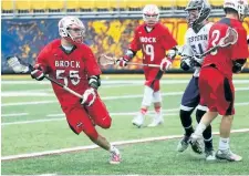 ?? FILE PHOTO ?? Alex Pace, No. 55, on the attack for a Brock University men's field lacrosse team that went undefeated before falling short in the Canadian championsh­ip final.