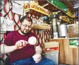  ??  ?? A Syrian coffee seller makes a coffee, in Gaziantep, in the south-west province of Turkey on May 1. (AFP)